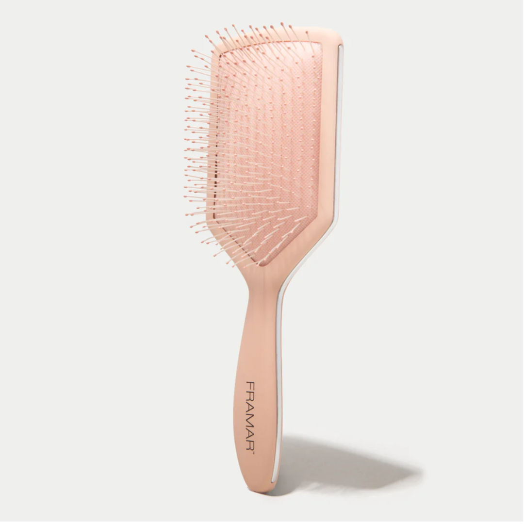 Framar Paddle Brush is with fine bristles and gives you painless brushing experience.