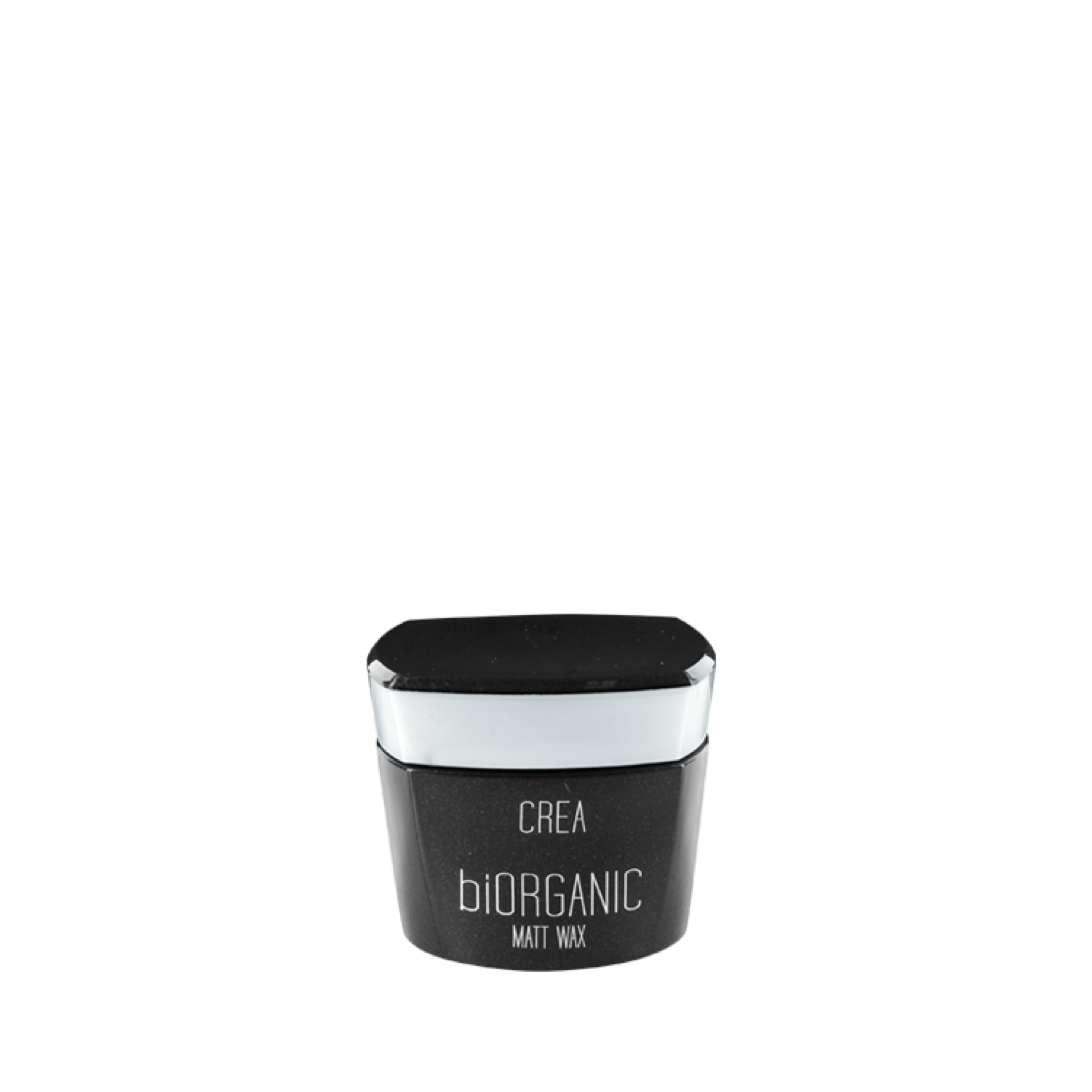 A black container of Maxxelle Créa Bioorganic Matt Wax. For strong hold and natural matte finish, ideal for sculpting and defining short to medium-length hair