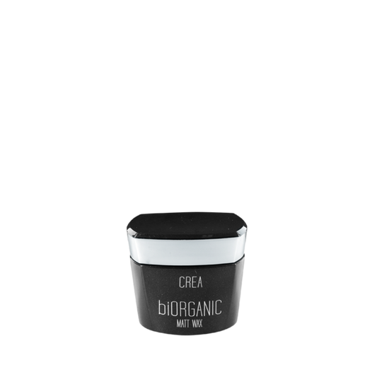 A black container of Maxxelle Créa Bioorganic Matt Wax. For strong hold and natural matte finish, ideal for sculpting and defining short to medium-length hair