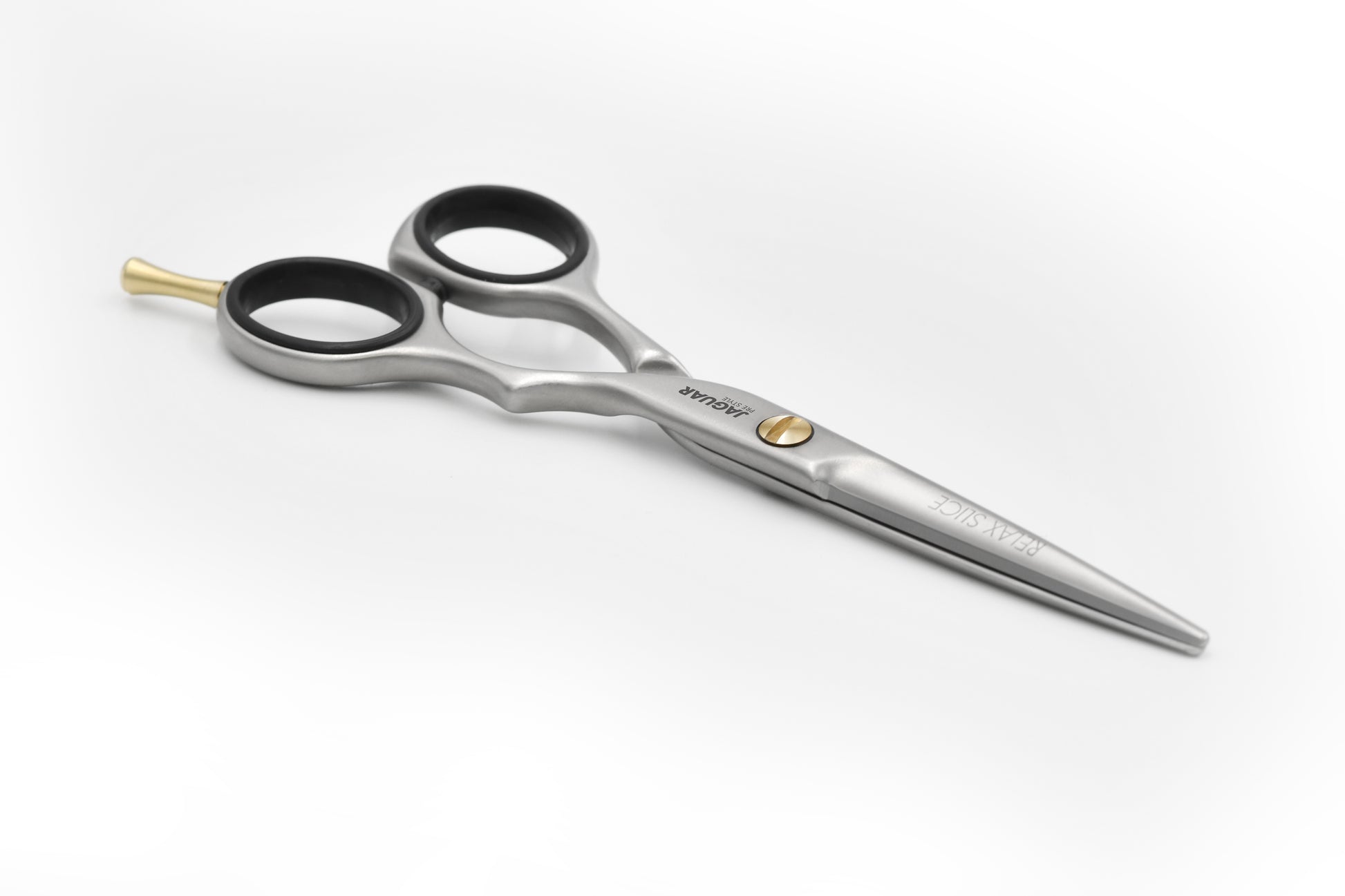 JAGUAR ERGO SLICE hairdressing scissors with sleek satin finish and classic design, perfect for hairstylists seeking quality and affordability. Available in various sizes, and also in polished ERGO P SLICE version. BASIC SET includes matching ERGO 28 texturing scissors